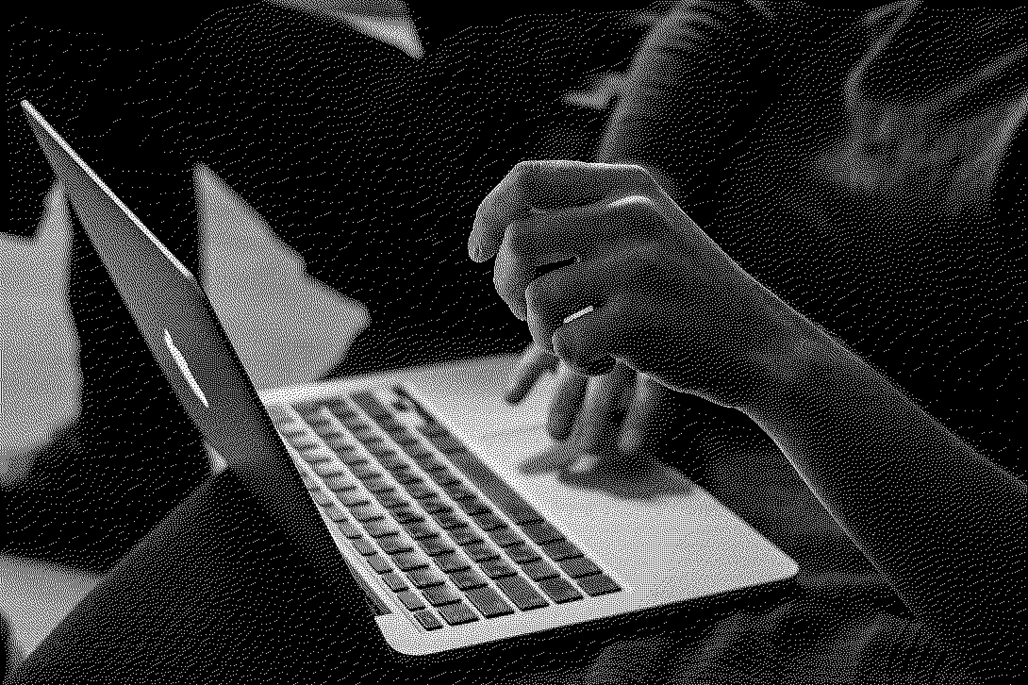 Person managing IP portfolio on laptop with particle visualization